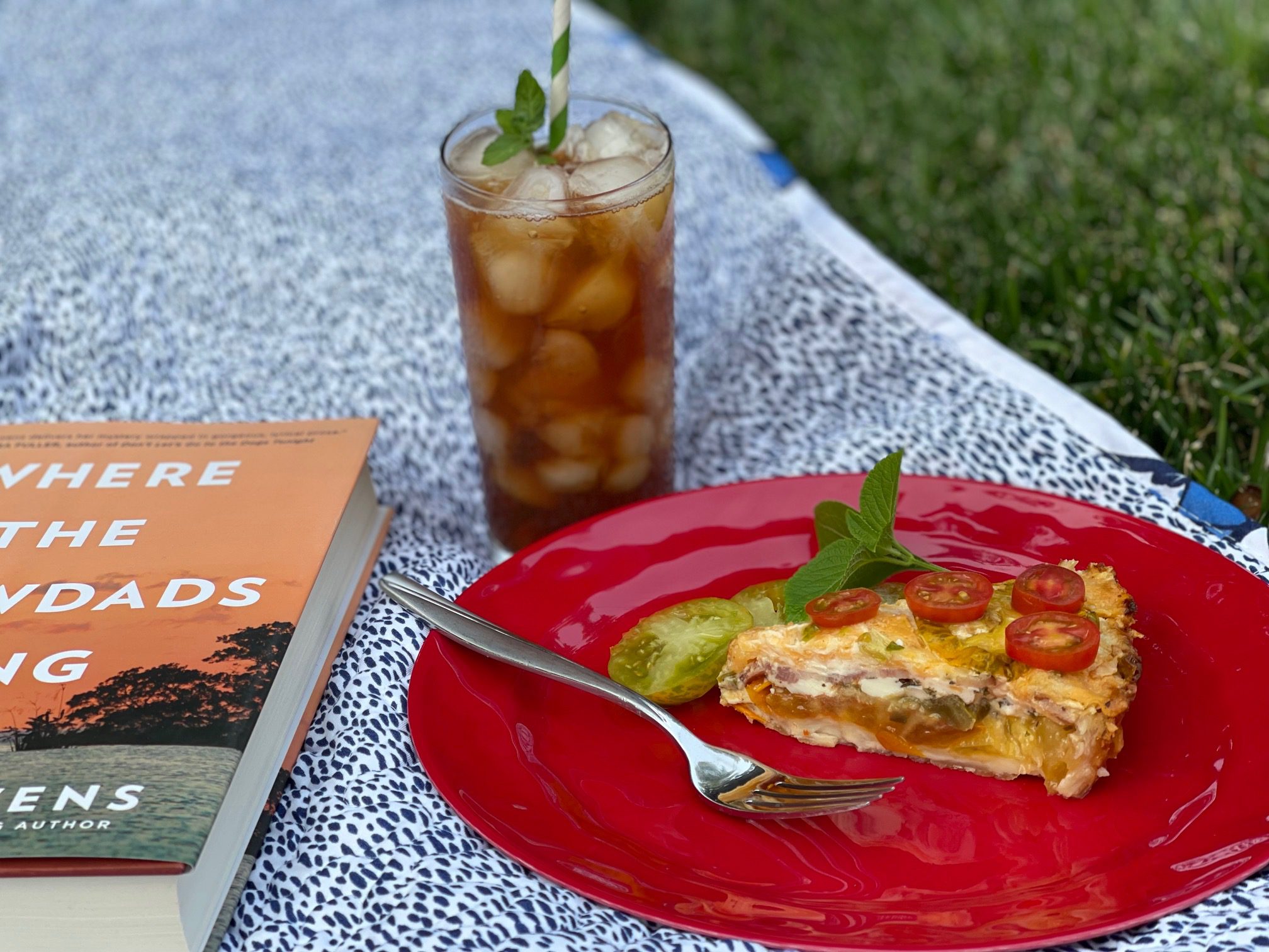 picnic with a piece of Southern tomato pie and iced tea picnic with a piece of Southern tomato pie and iced tea