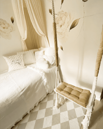 white and beige teenage bedroom with swing