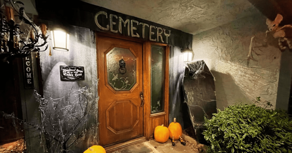 spooky halloween front entrance with cemetery sign