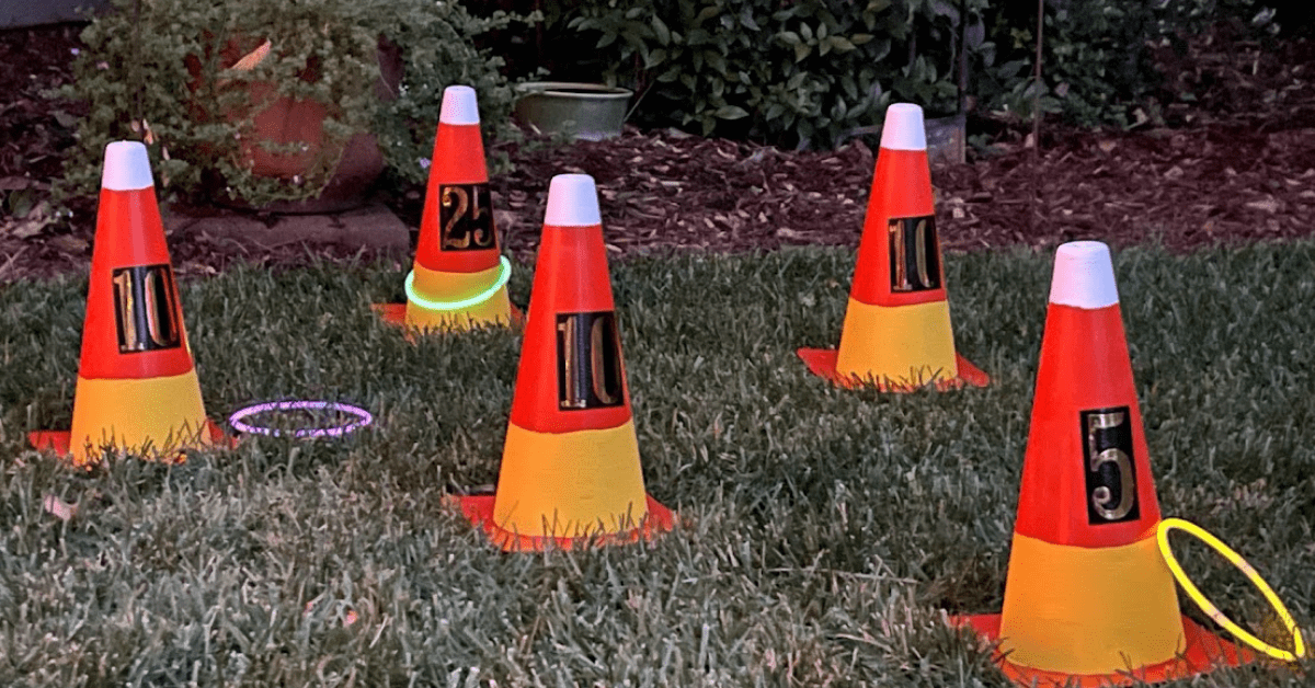 Candy corn ring toss game orange safety cones painted to look like candy corn