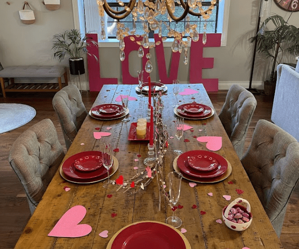 valentine's day table setting with centerpiece